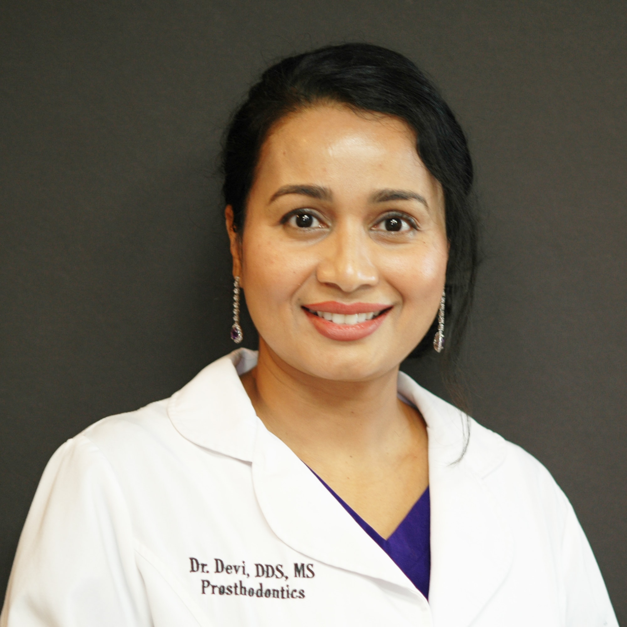 Dr. Devi — Prosthodontist